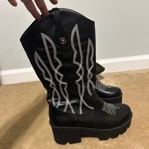 Platform cowboy boots.